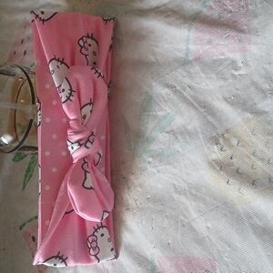 Hk pink youth-young adult headband.